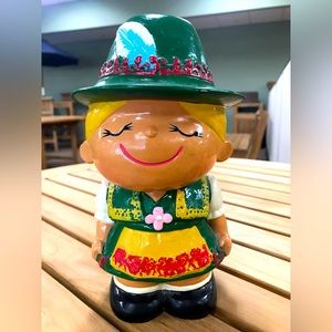 Vintage 1960s piggy bank.  Sweet alpine girl